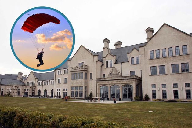Paraglider rescued and taken to hospital after crashing onto roof at five-star resort