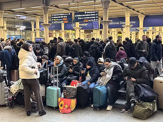 Delayed passengers at St Pancras train station, central London, after all Eurostar services were cancelled