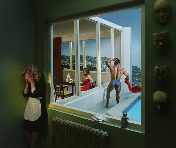 Melancholic woman in a dim room, observing a man in swimwear by a pool through a large window, with a cityscape backdrop.