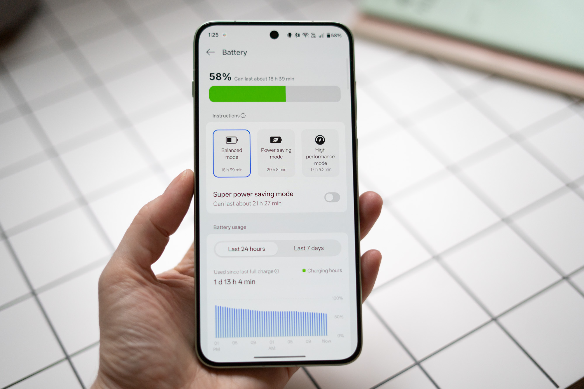 OnePlus 15R in green showing battery performance screen