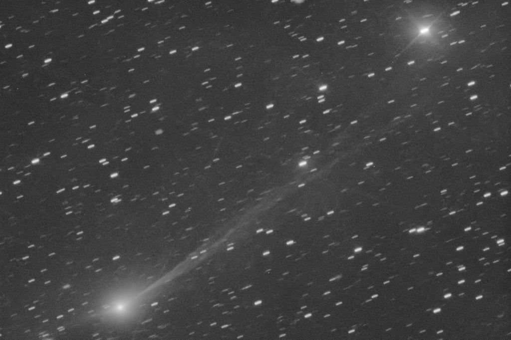 An image of the interstellar comet 3I/ATLAS as it streaks through space on November 19, 2025. Photo: Gianluca Masi via AP