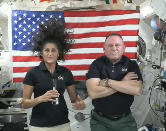 Astronauts Suni Williams and Butch Wilmore are pictured addressing the media