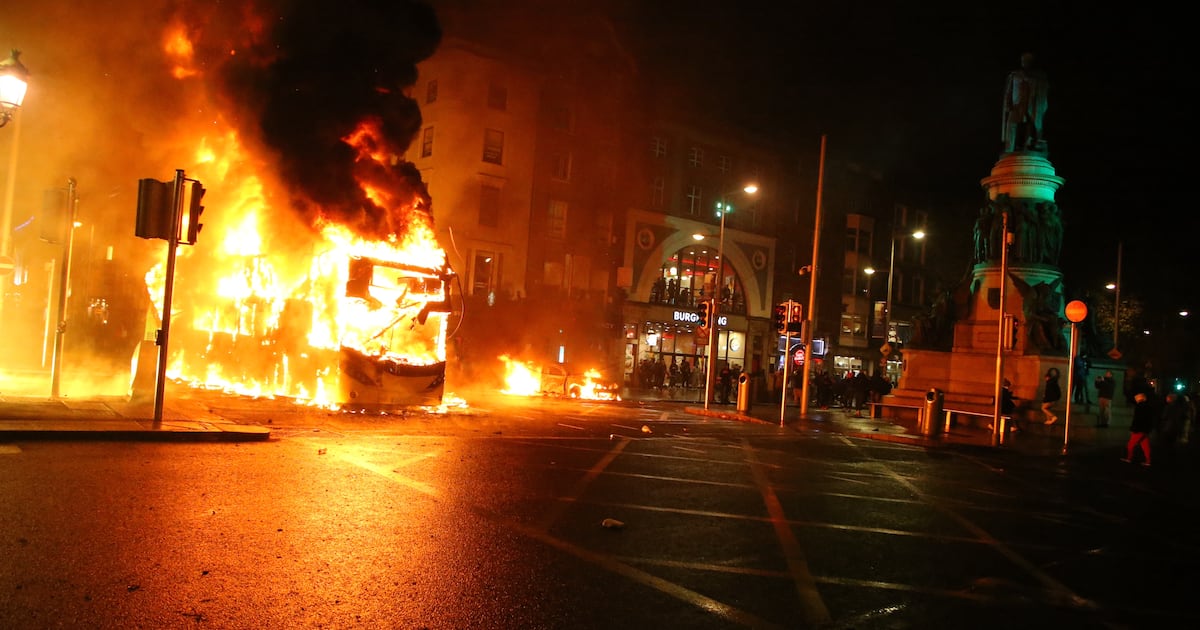 Woman who set fire to bus during Dublin riots jailed for six years – The Irish Times