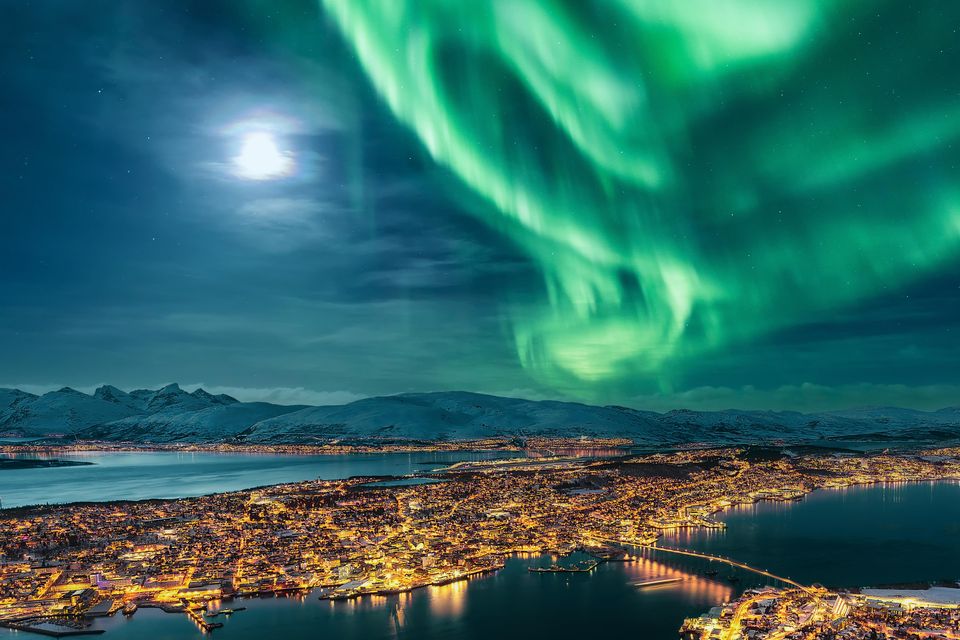 The Northern Lights over the city of Tromso. Photo: Getty
