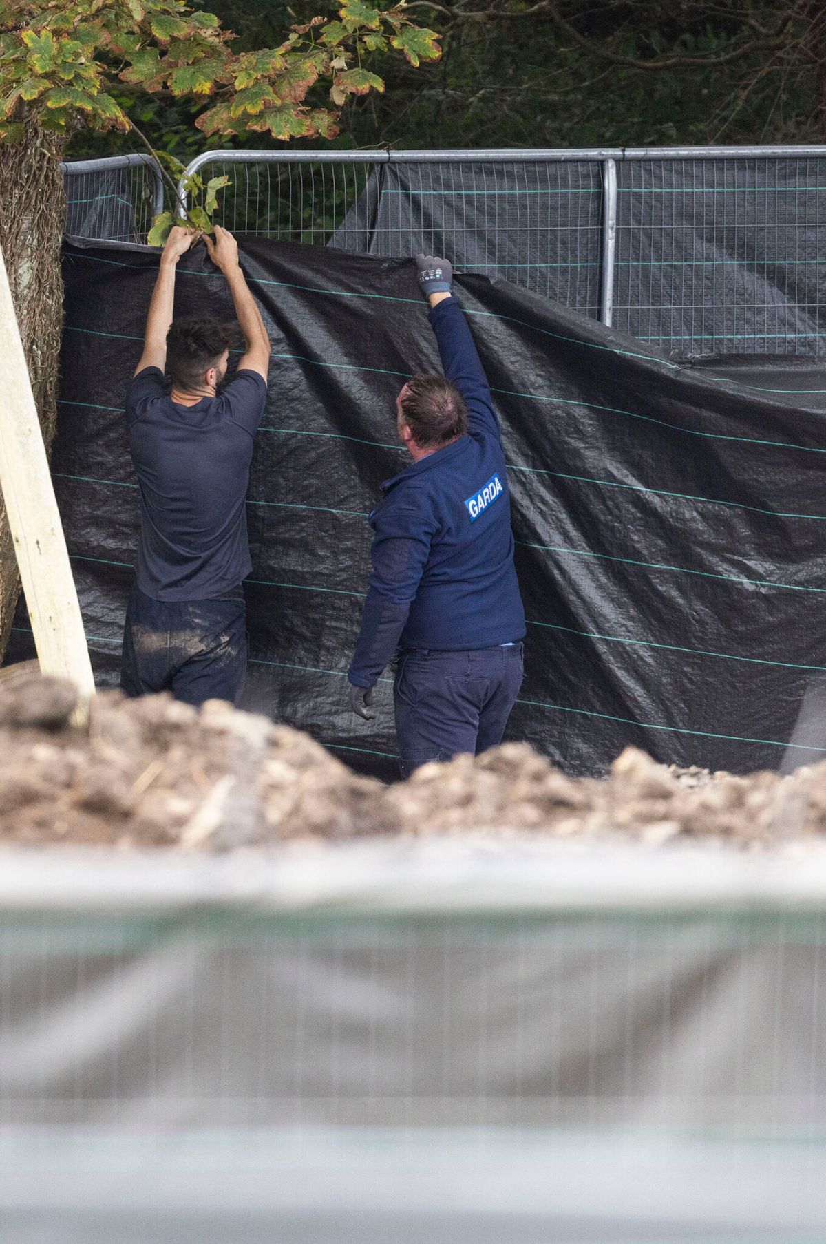 An Garda Siochana corden off an area where is believed body parts have been discovered in the search for Daniel Aruebose