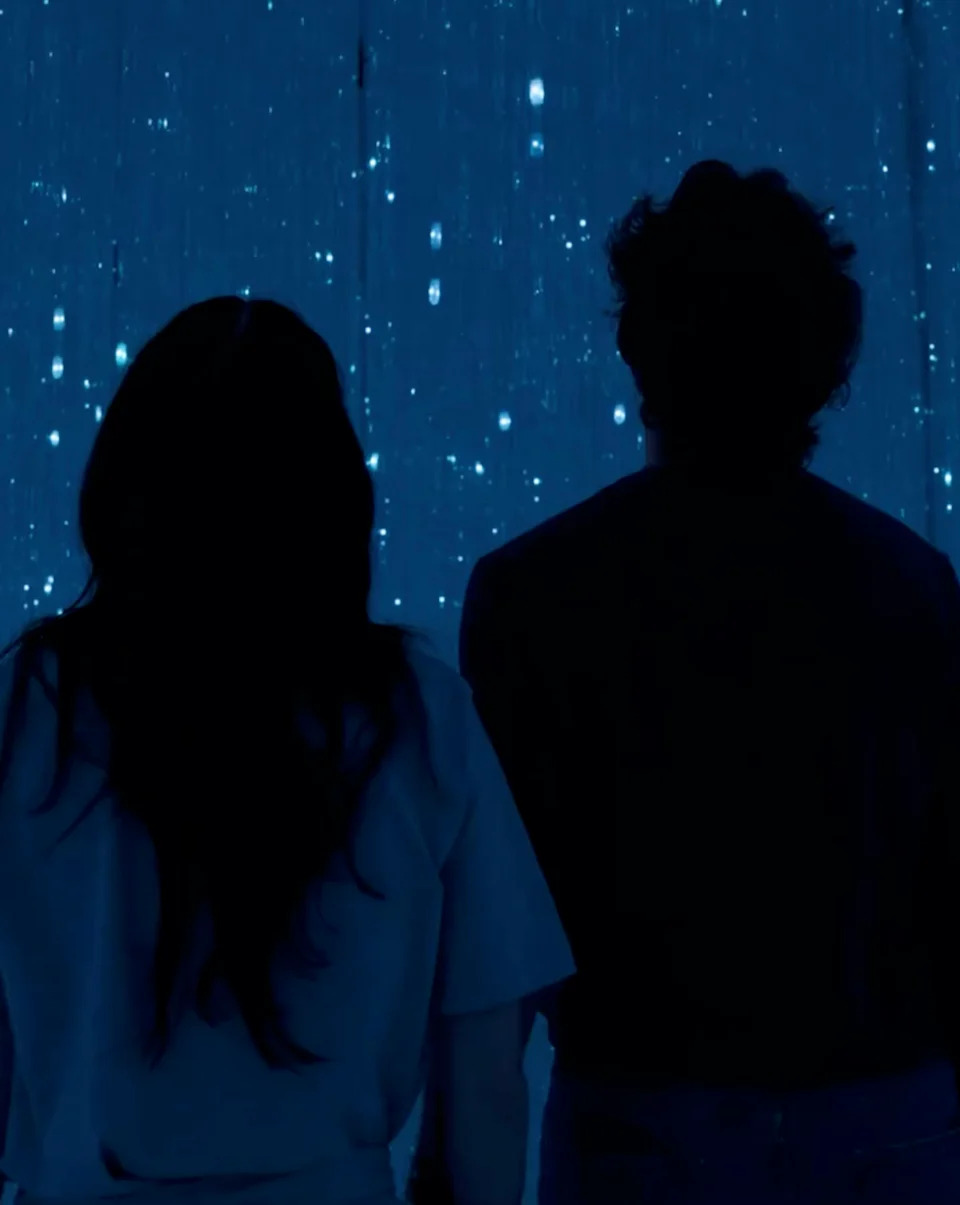 In one of the photos, the couple watched what appeared to be an illuminated piece at an art exhibit. Katy Perry/Instagram