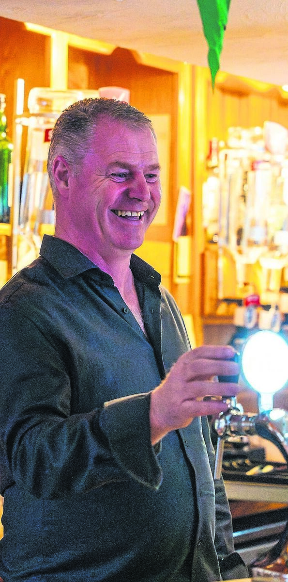 Pat O’Riordan behind the bar at O’Riordan’s in Coachford. He says: “A pub is where fellas meet, talk, unload after a hard day”.Picture: Noel Sweeney
                    