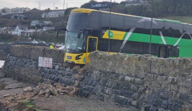 Double decker bus crashes through sea wall after driver parks it at Waterford tourist spot