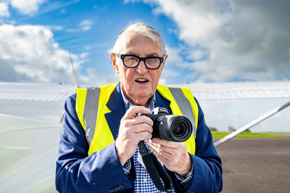 With his head quite literally among the clouds, Cork’s Dennis Horgan smiles as he launches The Coast of Cork: A View From Above, a celebration of the county’s landscapes seen through his unique aerial lens. Picture Chani Anderson.