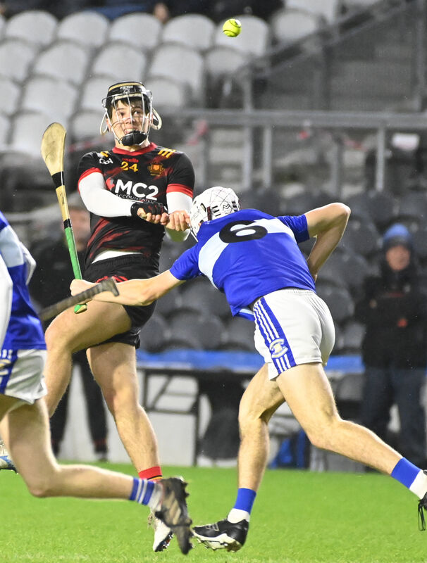 CBC's Alex Maher fires the sliotar past Gaelcholáiste Mhuire AG's Josh Ó'Brosnacháin. Picture: Eddie O'Hare