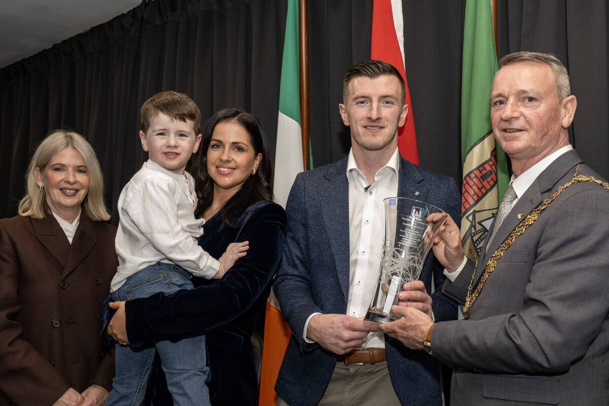 Cork's Lord Mayor, Cllr. Fergal Dennehy make a presention on behalf of Cork City Council to Patrick Horgan. Also included is Patrick's son Jack , his wife Ashley and Cork City Council Chief Executive Valerie O'Sullivan. Pic: Brian Lougheed 