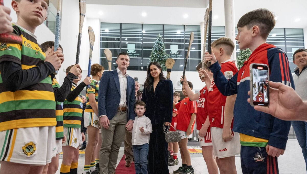 Glen Rovers under age hurlers give Patrick Horgan, his wife Ashely and son Jack a guard of honour. Pic: Brian Lougheed