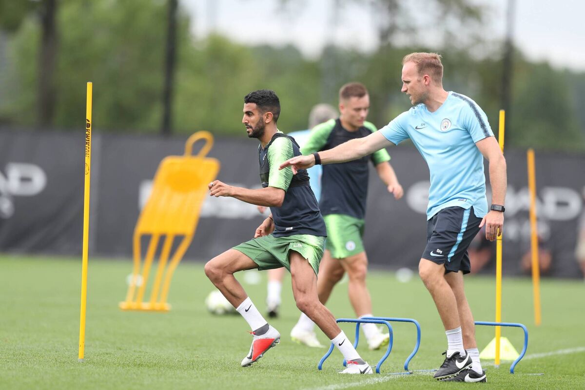  Shayne Murphy supervising training with Manchester City's Riyad Mahrez.