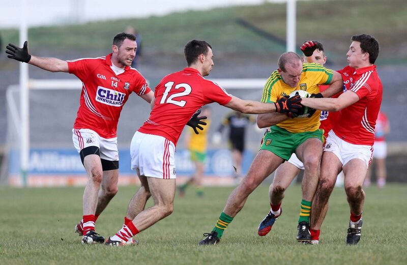 Neil Gallagher of Donegal under pressure from Kevin O'Driscoll and Mark Collins of Cork in 2015. Picture: INPHO/Andrew Paton