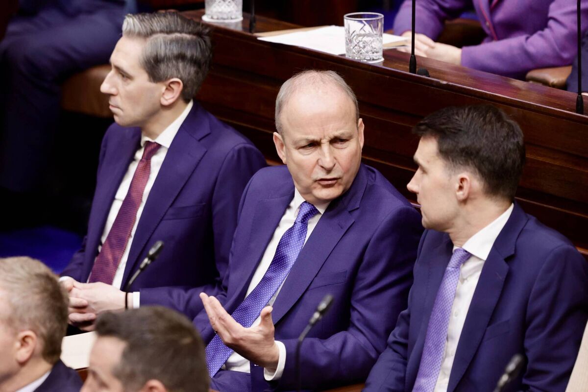 (Left to right) Simon Harris, Micheál Martin, and Jack Chambers in the Dail chamber ahead of the vote on the nomination of Mr Martin as Taoiseach in January. Photo: Flickr Houses of Oireachtas
