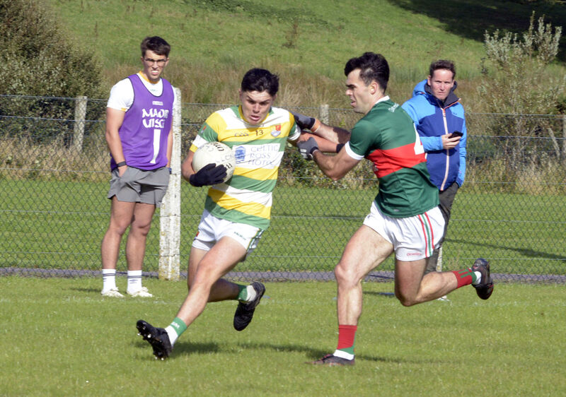  Carbery Rangers' Timmy Cullinane tries to move away from Clonakilty's David Lowney. Picture: Denis Boyle