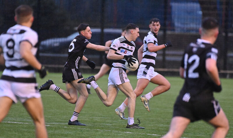  Eoin O'Leary, St Nick's, breaking past Daniel Holland, Donoughmore. Picture: Dan Linehan
