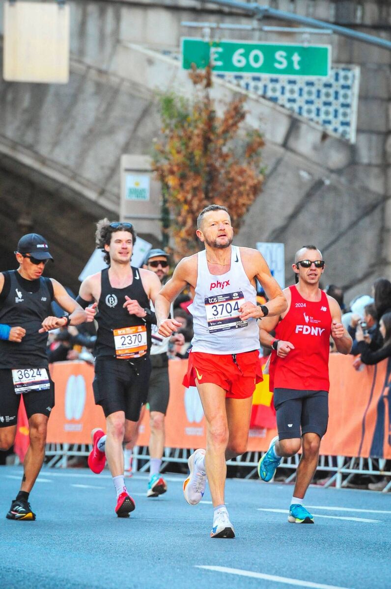 ROAD TO RECOVERY: Liam Cotter heading down Fifth Avenue while running during the New York Marathon.