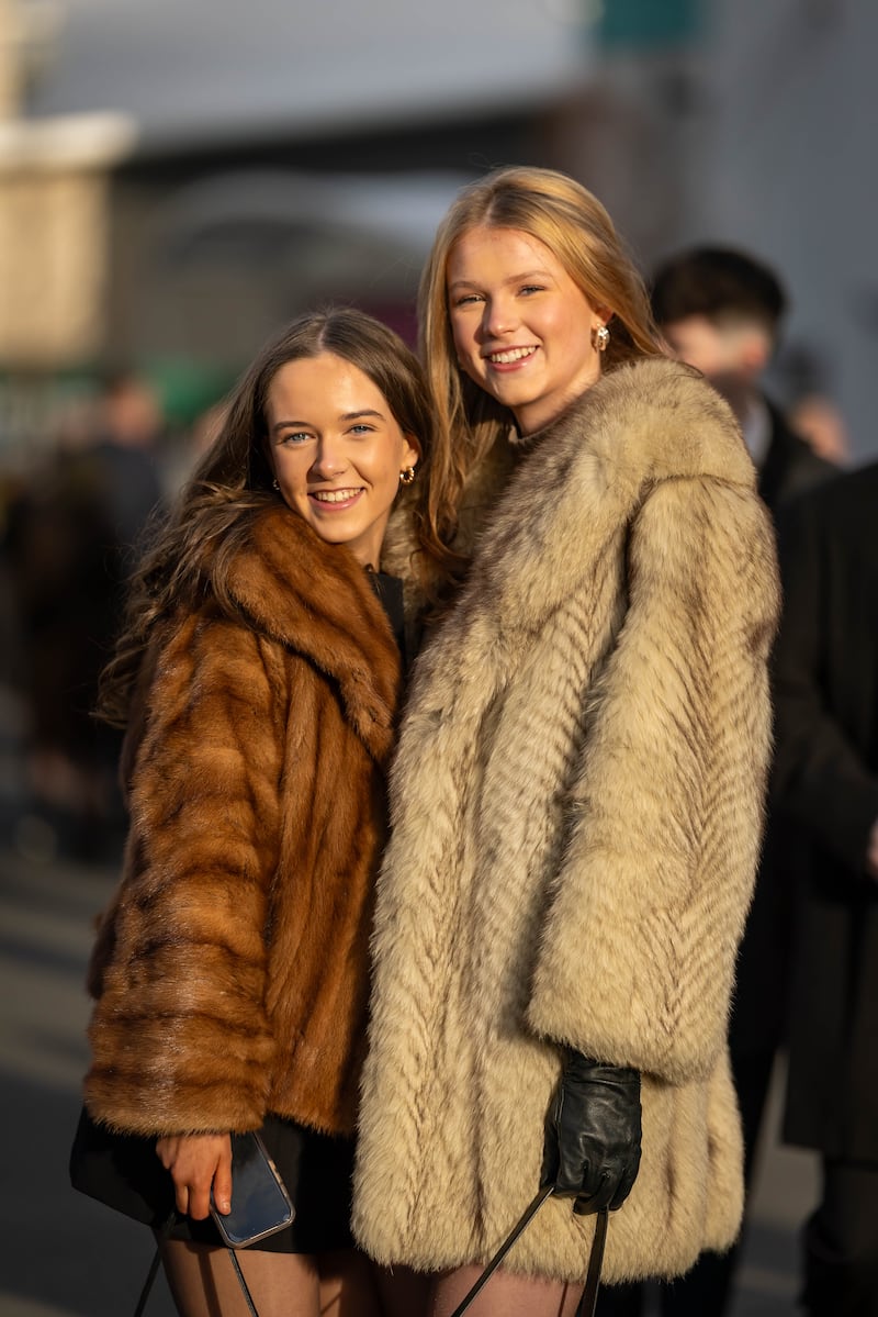 Eva Cormack and Aine Quinn enjoying the first day of the Leopardstown festival on St Stephen's Day. Photograph: Morgan Treacy/Inpho