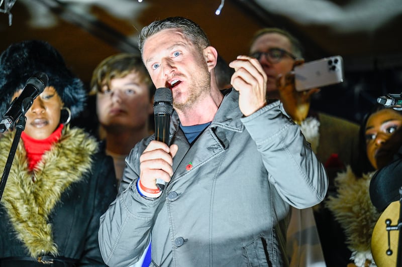 Tommy Robinson delivers a speech at a Unite the Kingdom Christmas event. Photograph: Ben Montgomery/Getty Images