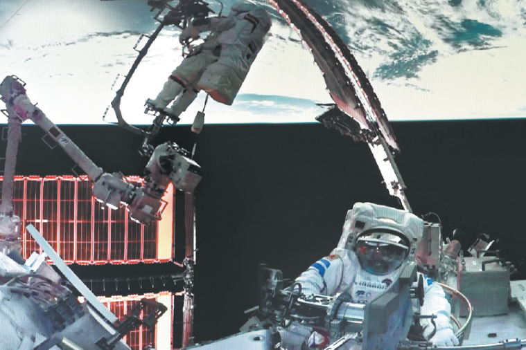 Shenzhou XXI astronauts conduct first spacewalk, install debris shields