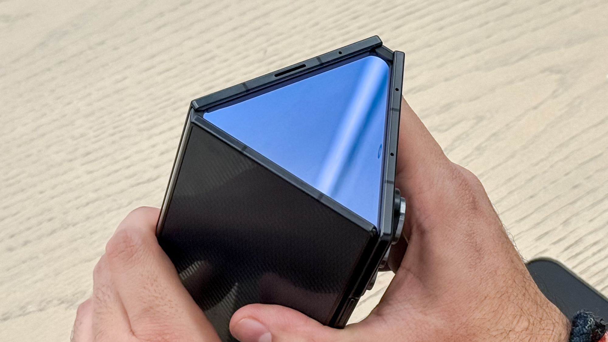 Samsung Galaxy Z TriFold folded into a triangle