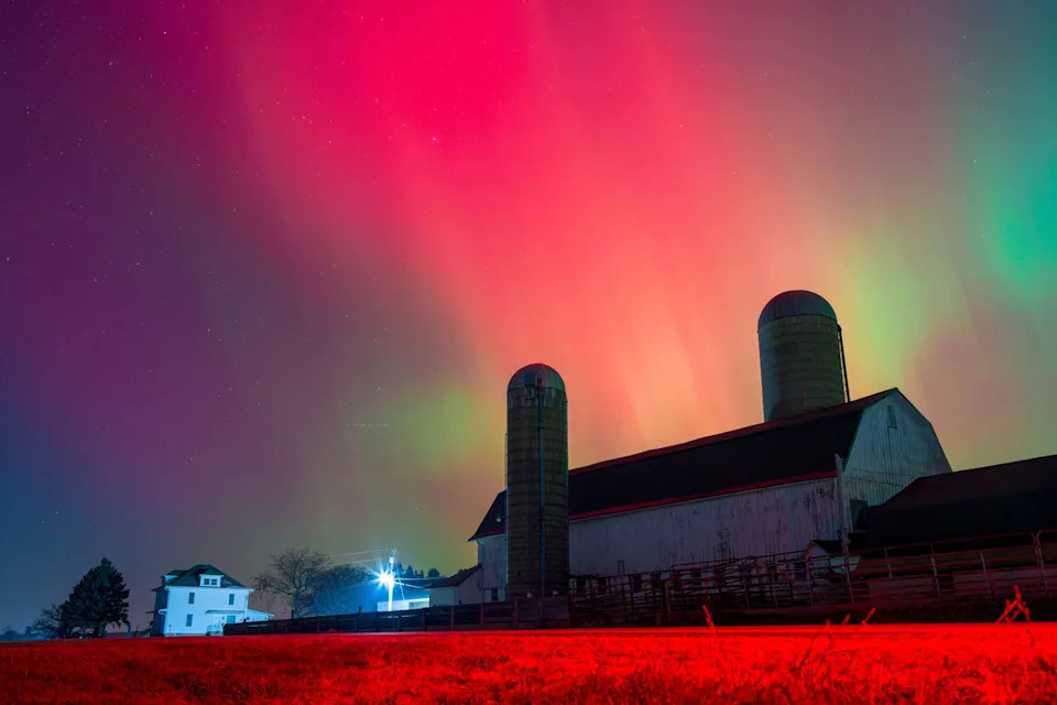 Ross Harried/NurPhoto via Getty The Aurora Borealis lights up the night sky over Monroe, Wisconsin