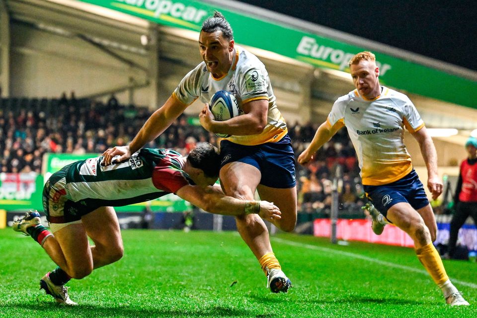 James Lowe is tackled by Will Wand of Leicester Tigers. Photo: Brendan Moran/Sportsfile