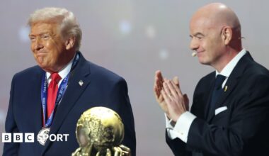 Donald Trump and Gianni Infantino with the Fifa Peace Prize trophy