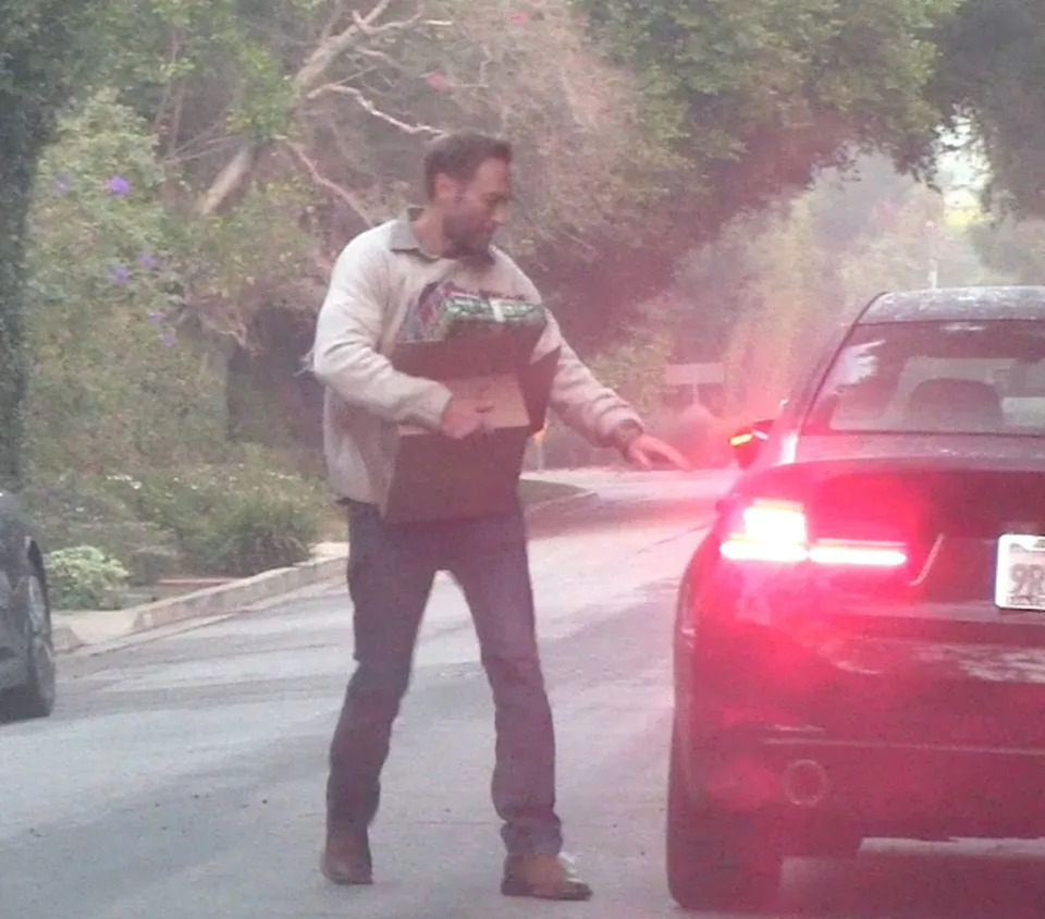 Miller wore a tan sweater over his button-down shirt and a pair blue jeans for the casual outing. /X17online.com