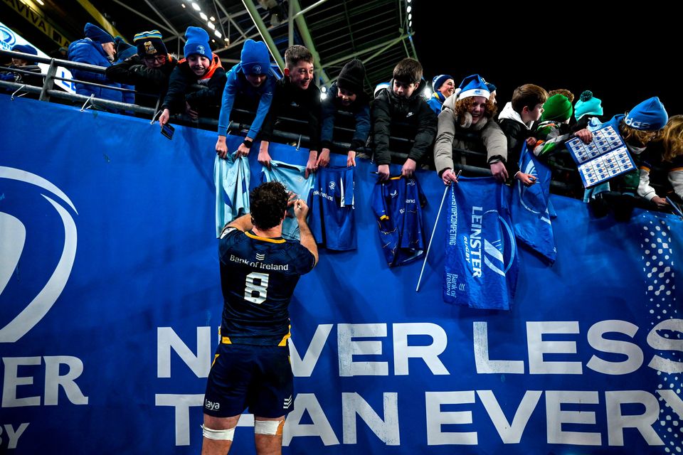 Caelan Doris signs autographs for young supporters after the Champions Cup win over Harlequins. Photo: Brendan Moran/Sportsfile