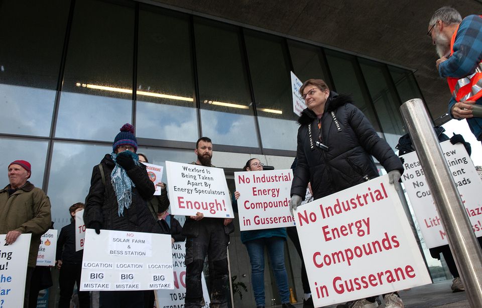 Residents from Gusserane protesting against the proposed solar development pictured outside the Wexford County Council on Monday. Pic: Jim Campbell