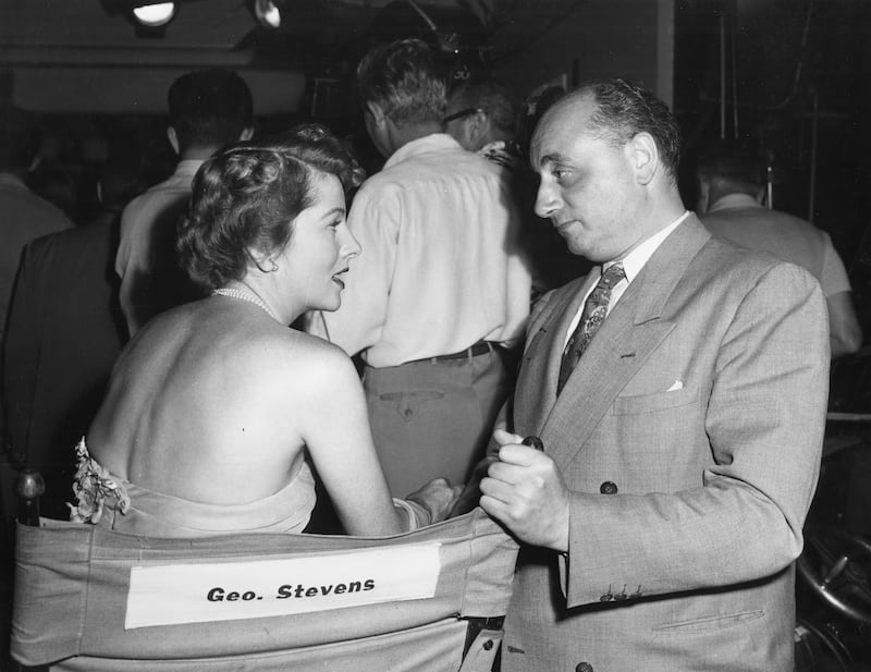 Louis Elliman pictured with Joan Fontaine on the set of Mr and Mrs Anonymous (Paramount). Courtesy of Wendy Elliman