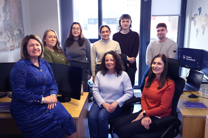 Maeve Mullin (left) of Finders International, with staff Aoife Long, Megan McAuley, Rayne McDonnell, Stephen Kennedy, Liam Cox, and (front) Elena Smyth and Lorna Fleming at their office in Dublin. Photograph: Dara Mac Dónaill 

















