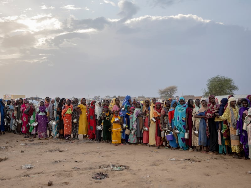 Sudanese refugees wait to receive food on the outskirts of a refugee camp in Adre, Chad. File image. Photograph: Ivor Prickett/The New York Times