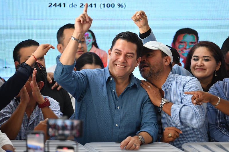 Honduras' Mayoral candidate for the ruling Libertad y Refundacion party, Juan Diego Zelaya, gestures during the vote count in Tegucigalpa, on December 2nd. Photograph: Orlando Sierra/ AFP via Getty Images