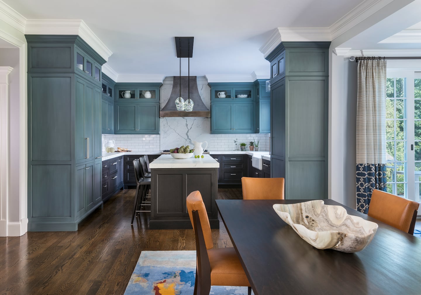 This teal kitchen was designed by Newton-based interior designer Vani Sayeed.