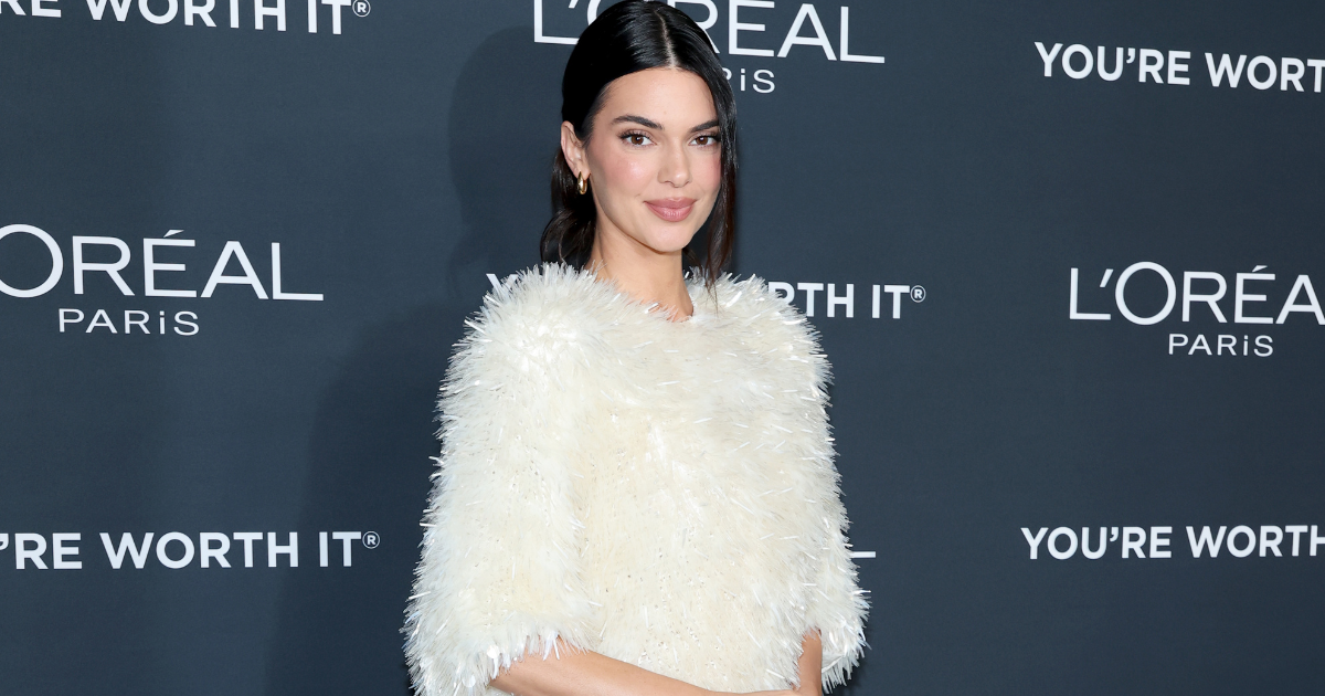 Kendall Jenner Trades Mugler Miniskirt for Festive Slinky Chanel Dress