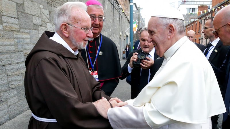 The late Br Kevin Crowley shaking hands with Pope Francis at the Capuchin Day Centre in Dublin. Photograph: Maxwell Photography/PA Wire