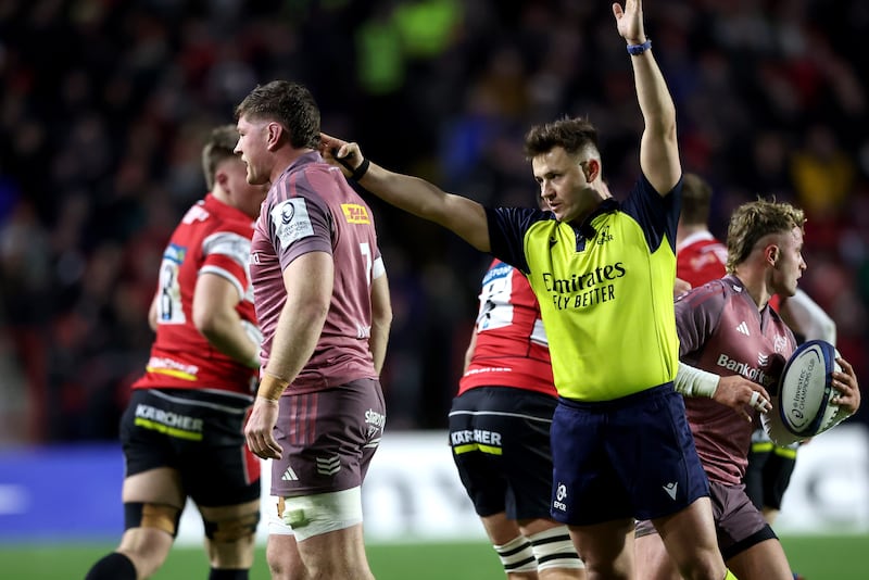Referee Ben Breakspear awards a penalty. Photograph: Billy Stickland/Inpho