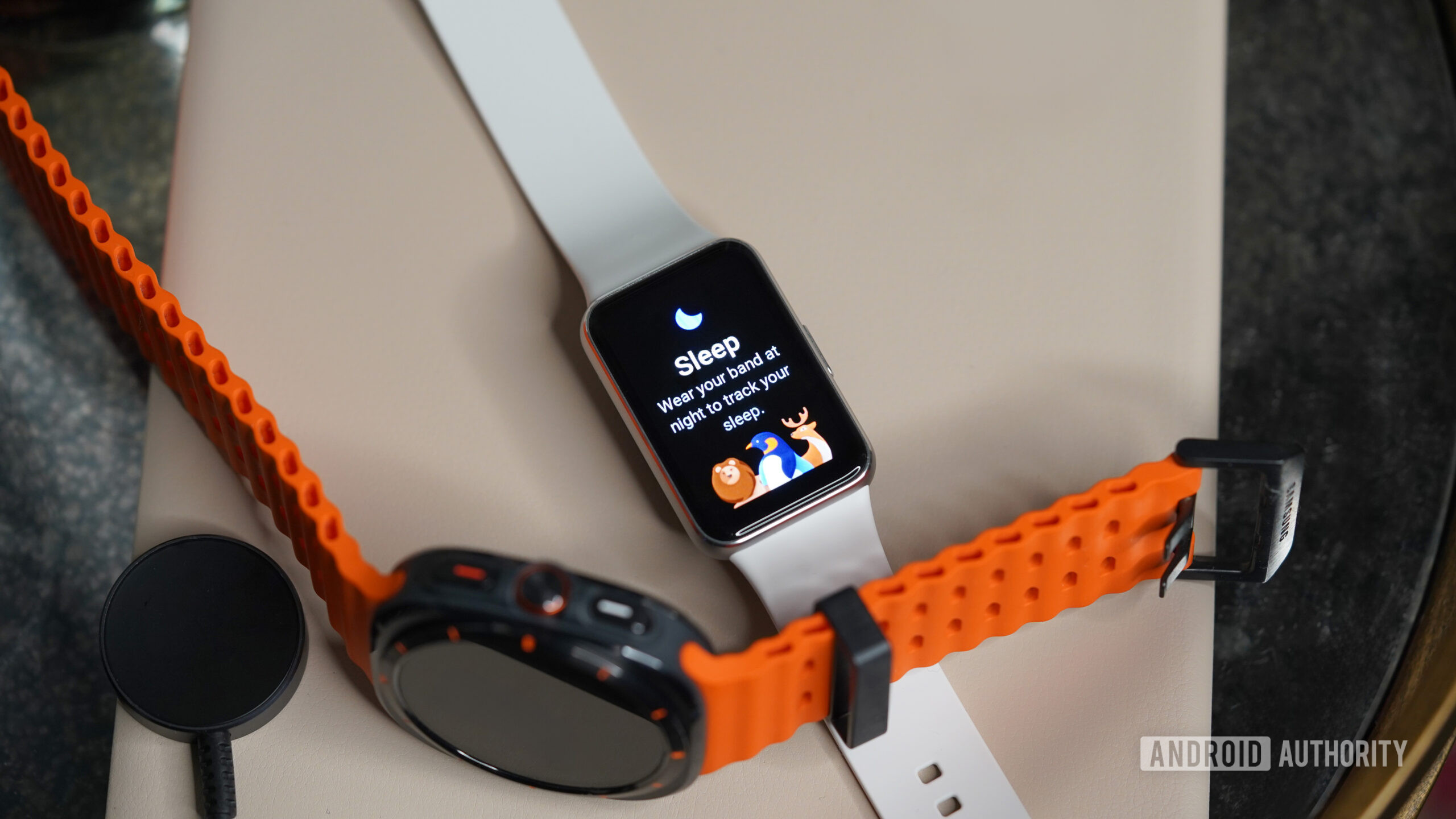 Galaxy Fit 3 Watch Ultra A Galaxy Fit 3 rests alongside a Galaxy Watch Ultra.