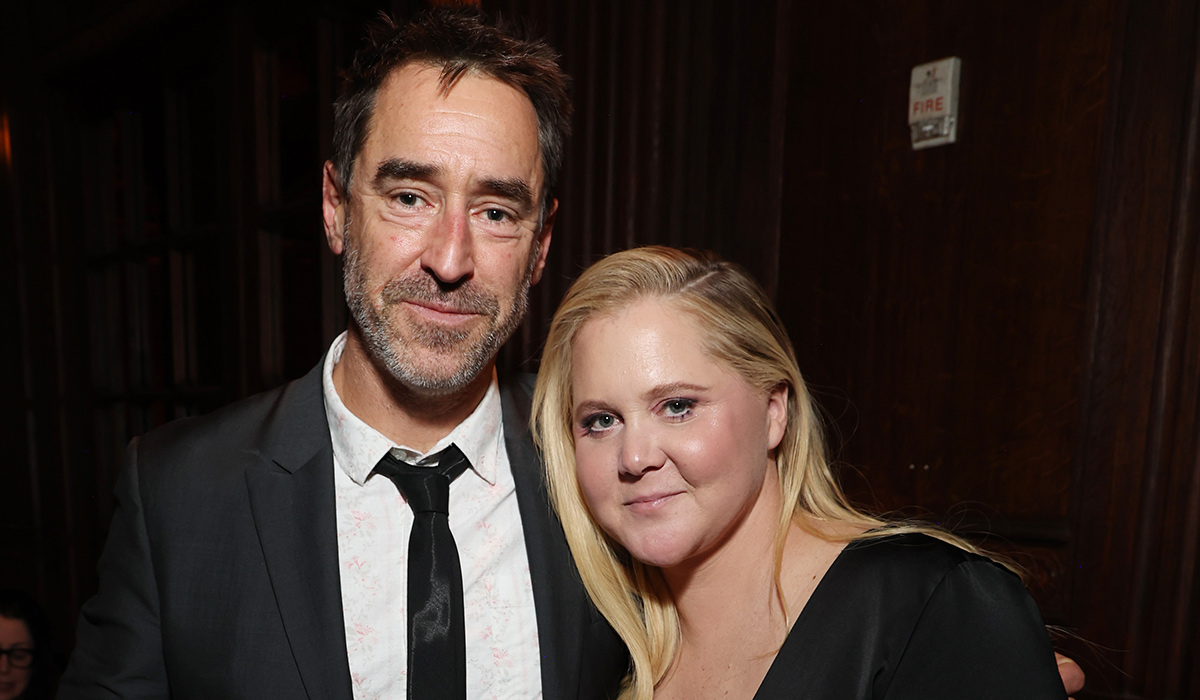 NEW YORK, NEW YORK - FEBRUARY 03: (L-R) Chris Fischer and Amy Schumer attend the "Kinda Pregnant" premiere on February 03, 2025 in New York City. (Photo by Kevin Mazur/Getty Images for Netflix)