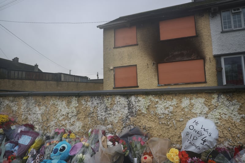 Flowers and toys outside the Castleview Park house where Tadhg Farrell (4) and his grand aunt Mary Holt (60) died in a firebomb attack in Edenderry Co.Offaly. Photo: Bryan O’Brien / The Irish Times 