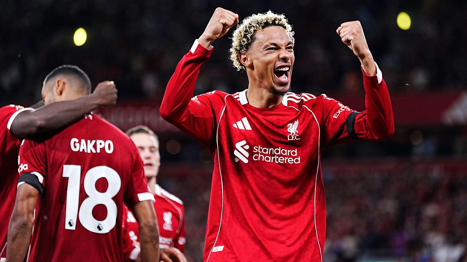 Liverpool's Hugo Ekitike (right) celebrates their side's second goal of the game, scored by team-mate Cody Gakpo (left) during the Premier League match at Anfield, Liverpool. Picture date: Friday August 15, 2025.
