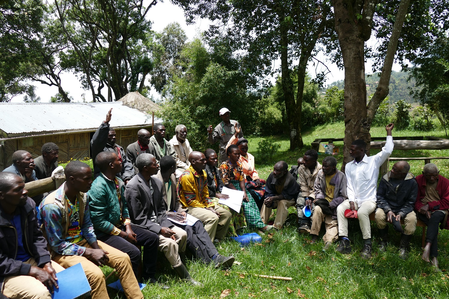 Community members at a meeting to decide which interventions by conservation groups and local government best suit their needs.