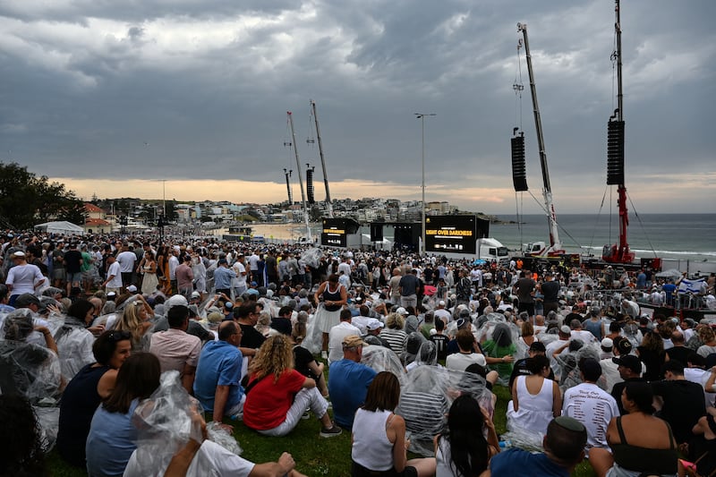 Mourners at the service at Bondi on Sunday. Photograph: Saeed Kahn/AFP via Getty