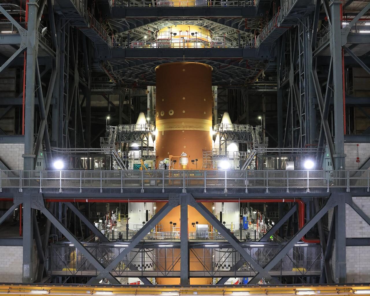 NASA’s Artemis II Orion spacecraft with its launch abort system is stacked atop the agency’s SLS (Space Launch System) rocket in High Bay 3 of the Vehicle Assembly Building at NASA’s Kennedy Space Center in Florida on Monday, Oct. 20, 2025. The spacecraft will carry NASA astronauts Reid Wiseman, Victor Glover, Christina Koch, and CSA (Canadian Space Agency) astronaut Jeremy Hansen on a 10-day mission around the Moon and back in early 2026. Teams will begin conducting a series of verification tests ahead of rolling out the integrated SLS rocket to NASA Kennedy’s Launch Complex 39B for the wet dress rehearsal. 