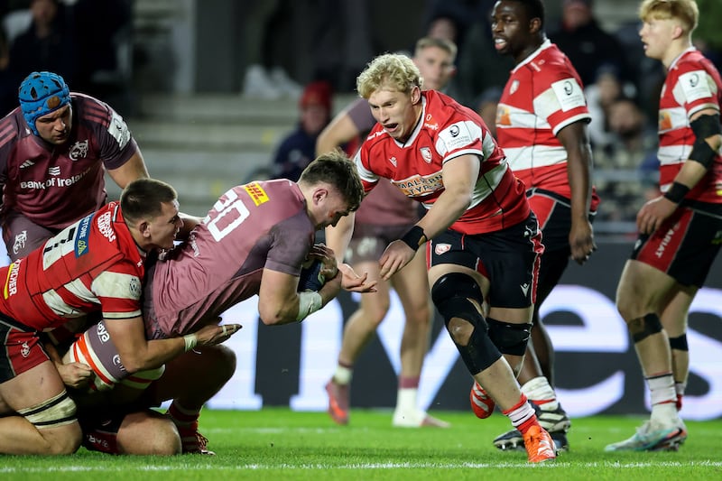 Munster's Ruadhán Quinn scores a try  against Gloucester. Photograph: Billy Stickland/Inpho