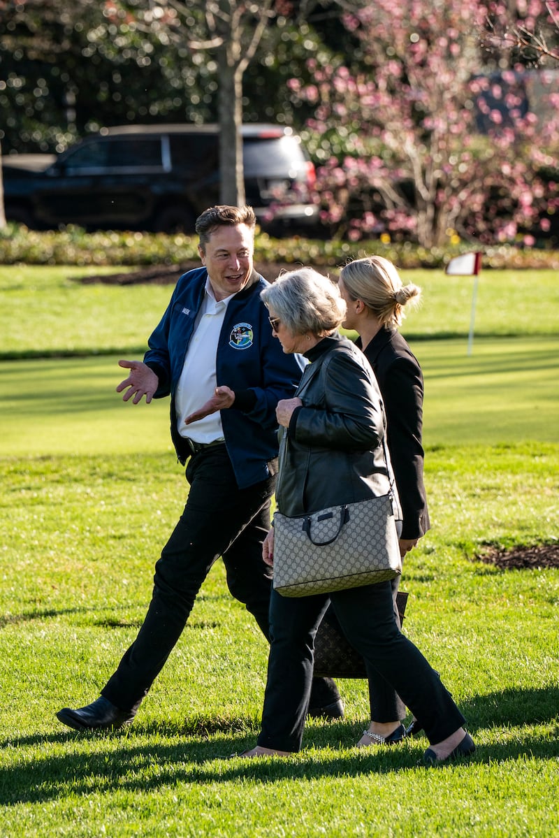 Elon Musk speaks with Susie Wiles, the White House chief of staff. Photograph: Haiyun Jiang/The New York Times                     