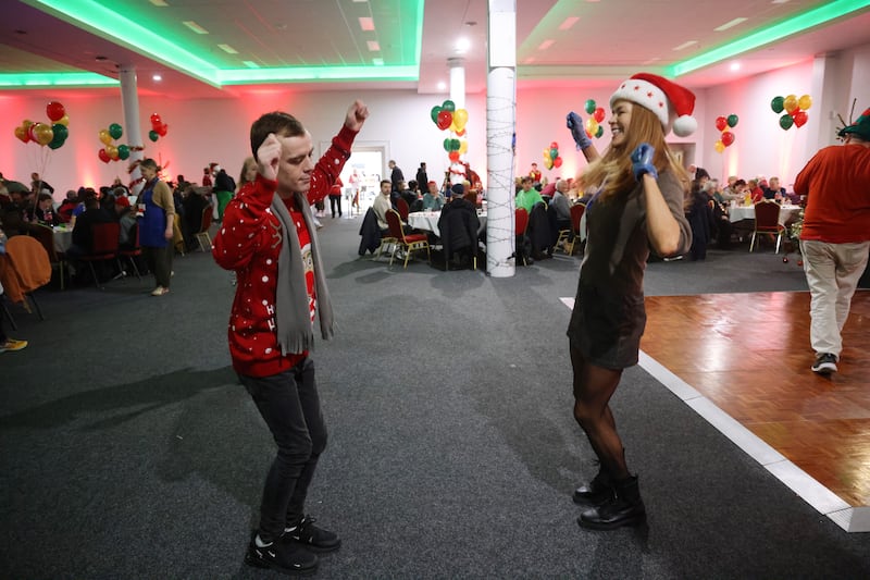 Glen Costello dances with volunteer Gillian Callaghan at the RDS on Christmas Day. Photograph: Bryan O’Brien